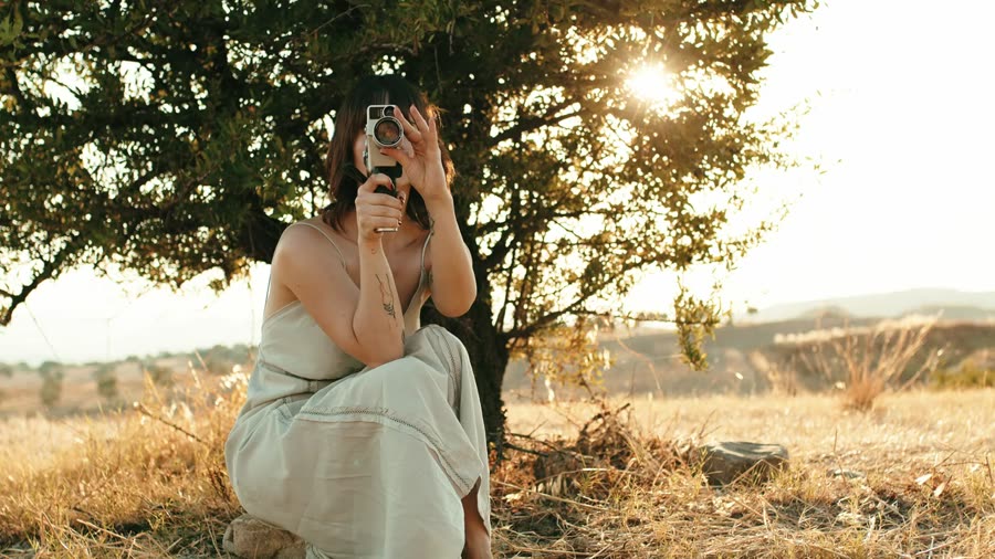Golden field, camera in hand